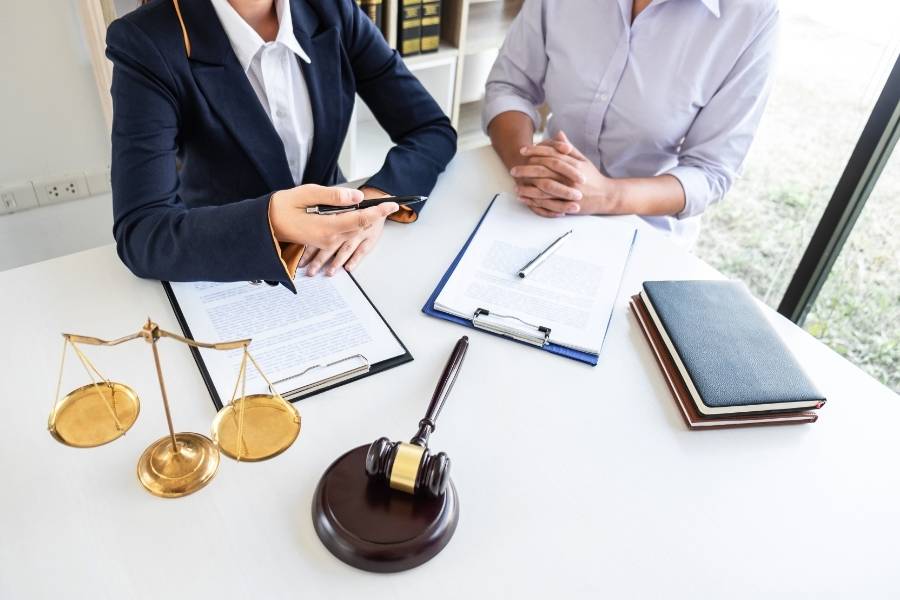 Lawyer meeting with client to discuss timeshare cancellation in Charlotte, North Carolina