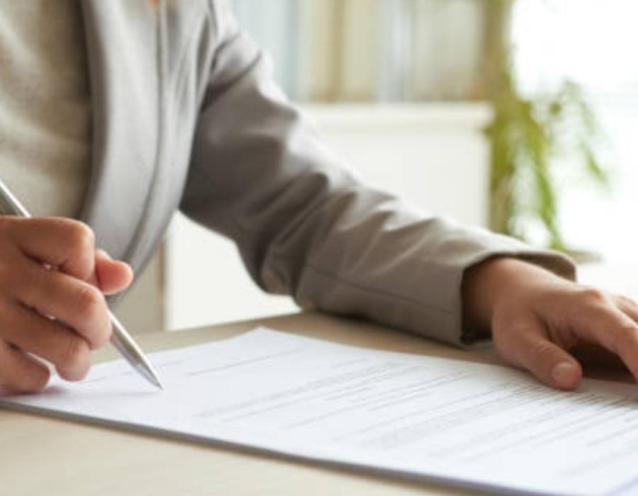 timeshare lawyer signing a timeshare cancellation