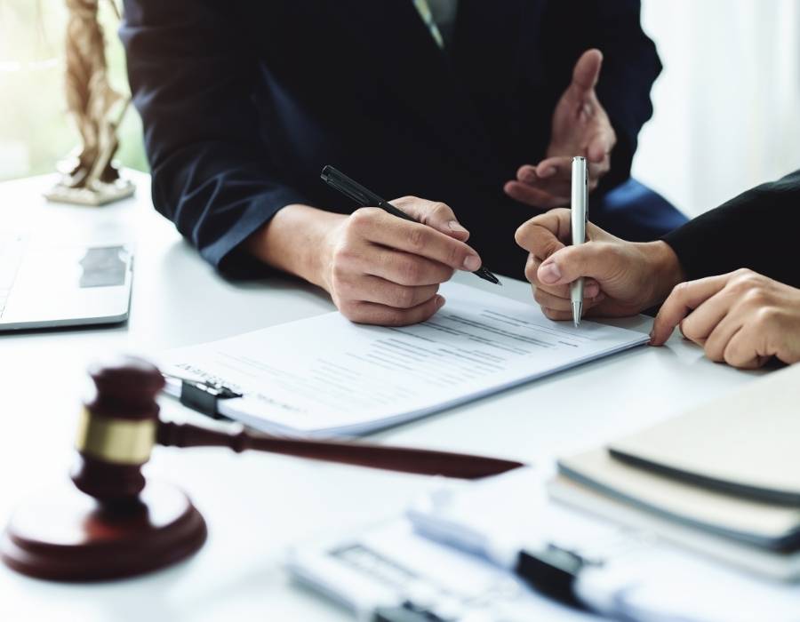 timeshare lawyer signing a timeshare cancellation contract