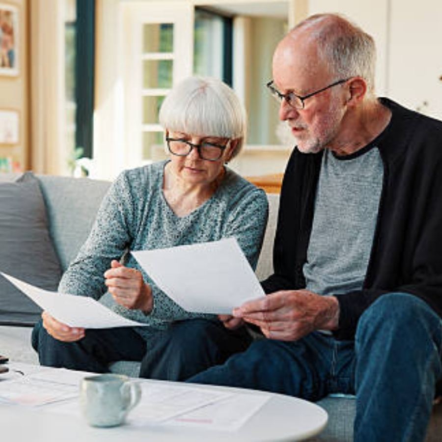 senior couple reviewing timeshare contract