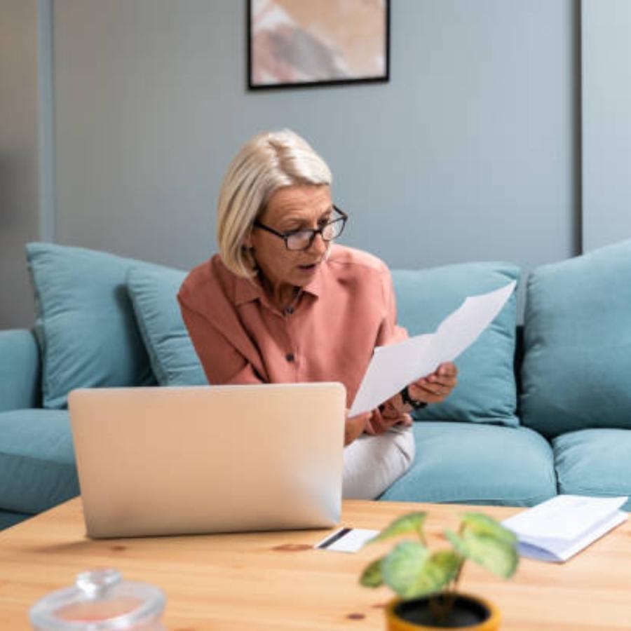 senior woman reviewing a timeshare contract