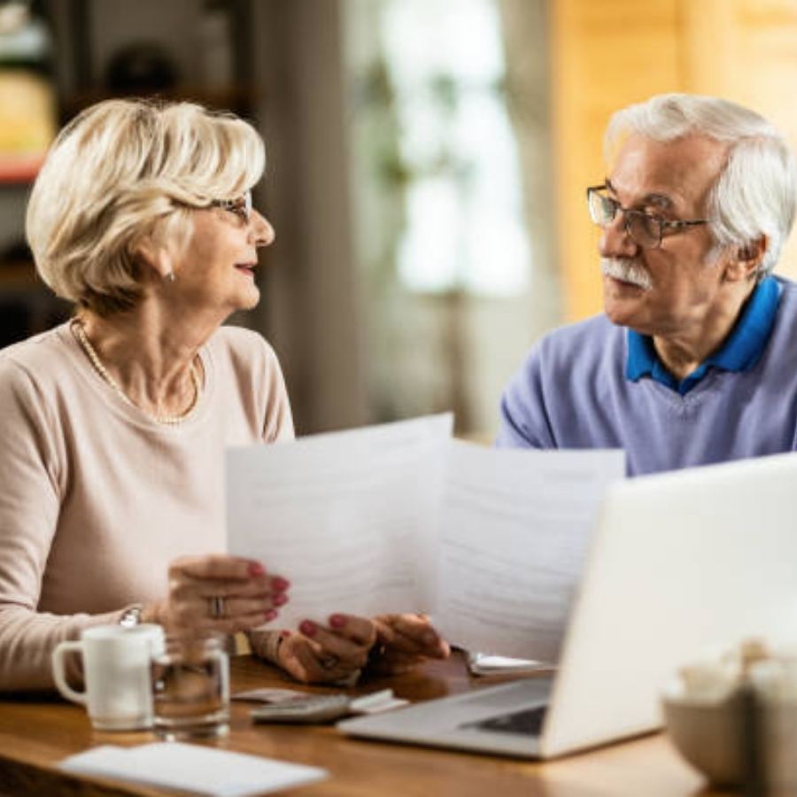 senior couple reviewing timeshare contract