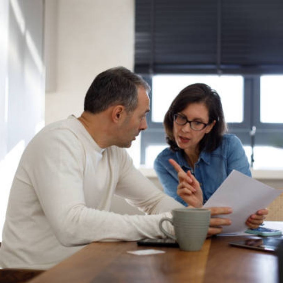 senior couple reviewing timehare contract