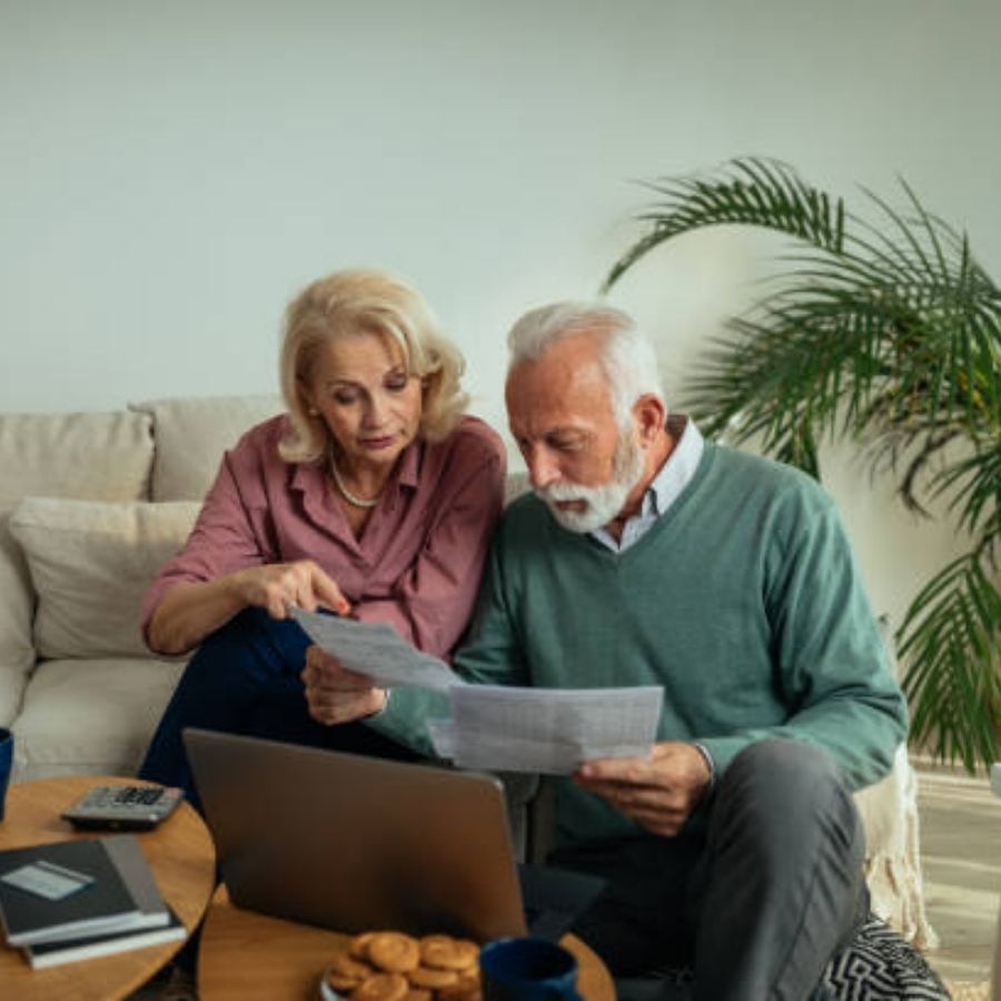 senior couple reviewing timeshare contract