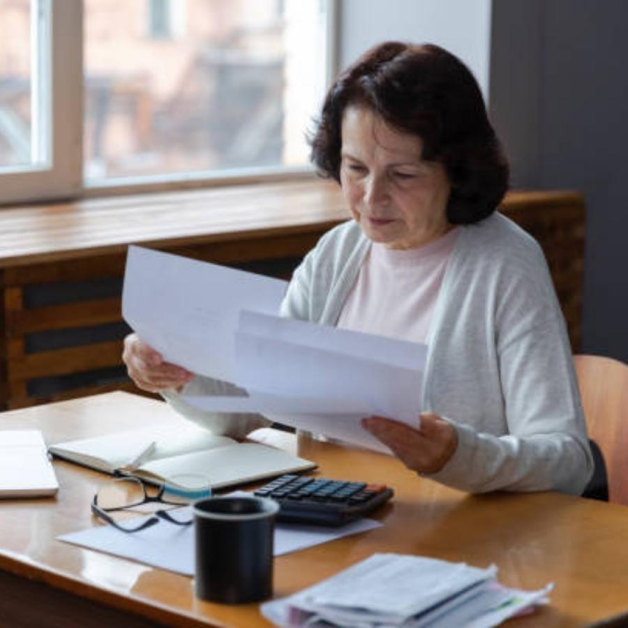 senior women reviewing a timeshare contract