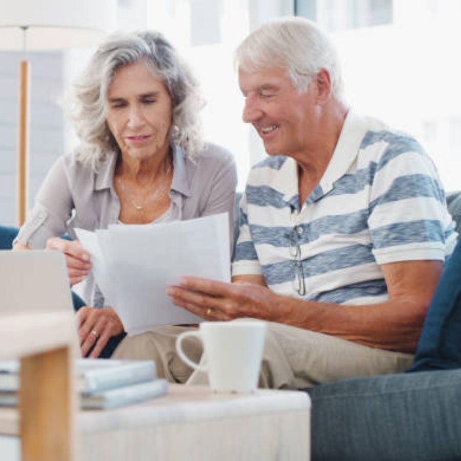 senior couple reviewing timeshare contract