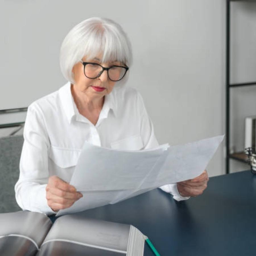 senior woman reviewing a timeshare contract