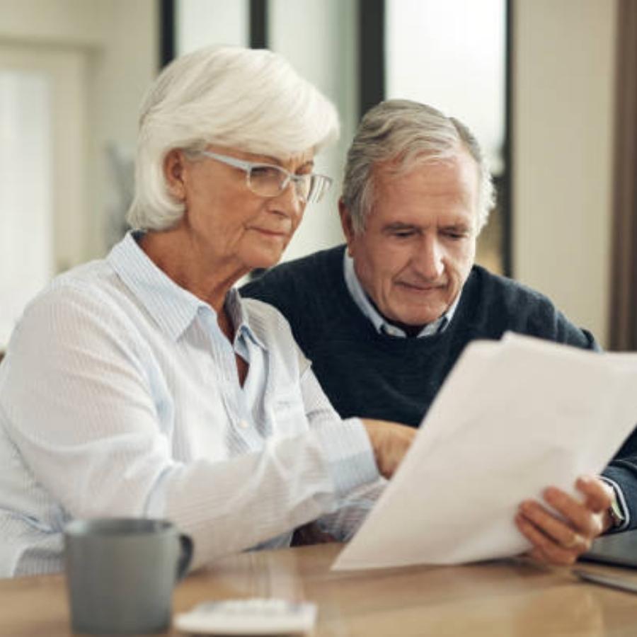 stressed senior couple reviewing a timeshare cancellation