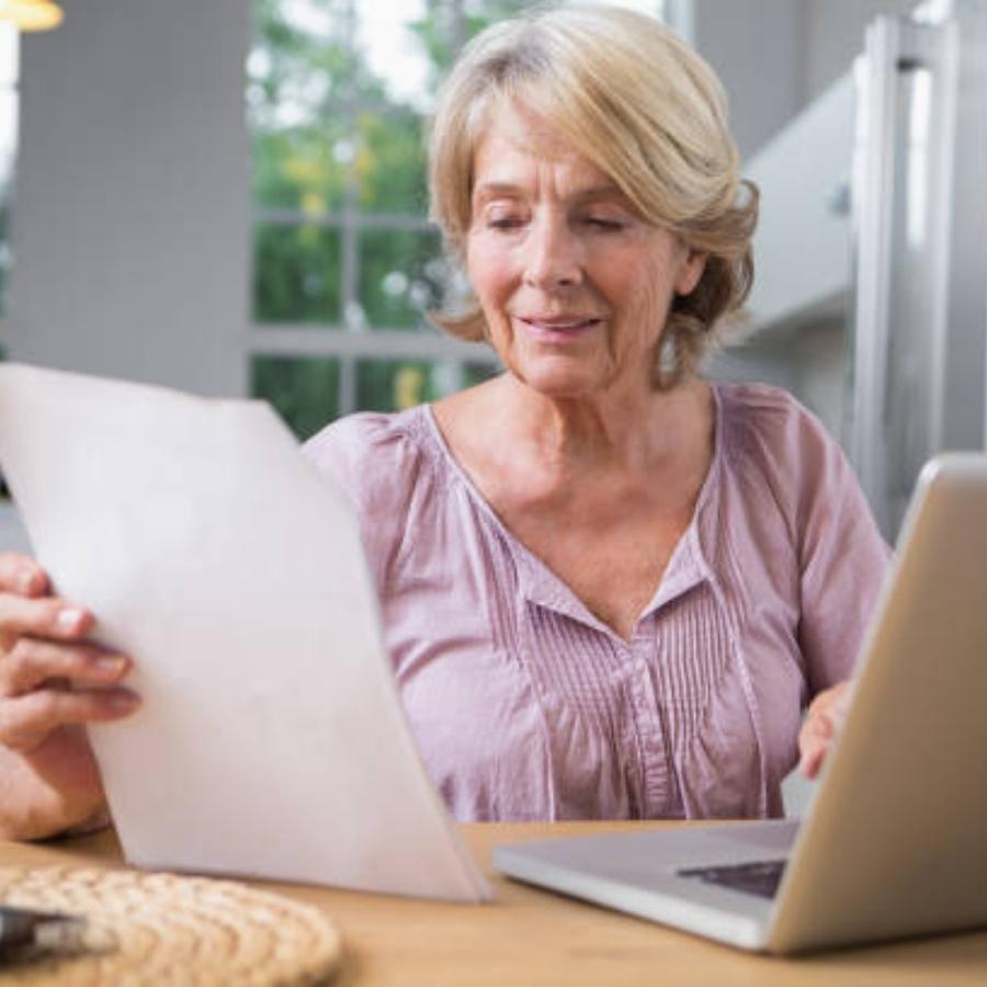 senior woman reviewing a timeshare contract