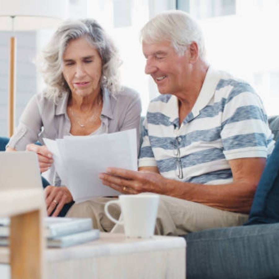 senior couple reviewing timeshare contract