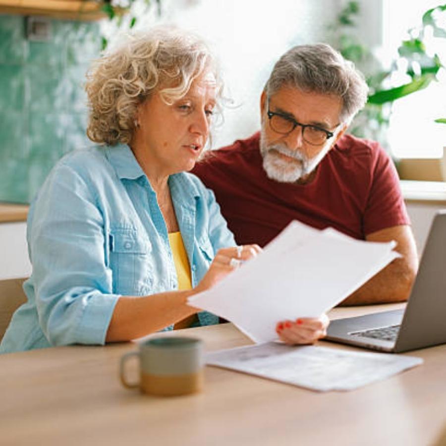 senior couple reviewing a timeshare contract