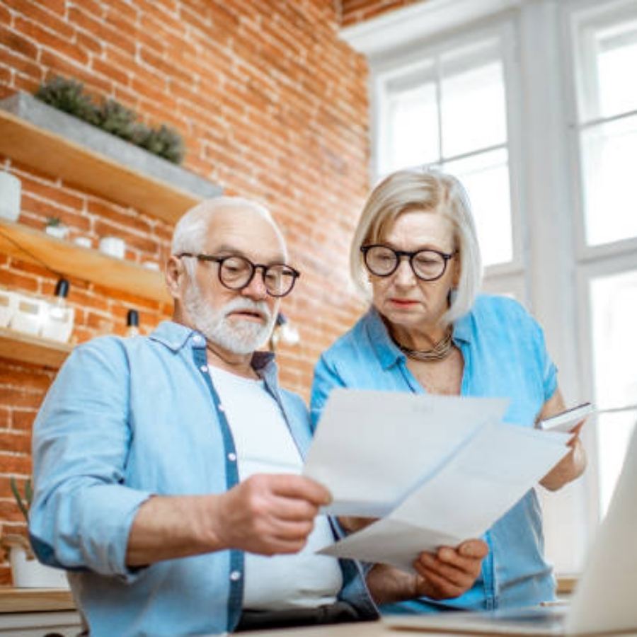 senior couple reviewing timeshare contract