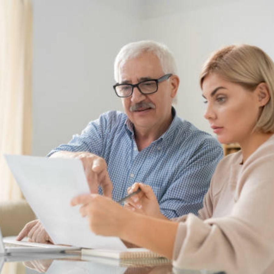 senior couple reviewing timeshare contract